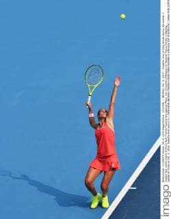 (151005) -- BEIJING, Oct. 5, 2015 -- Roberta Vinci of Italy serves during her women s singles first round match of China Open Tennis Tournament against Alison Van Uytvanck of Belgium at National Tennis Center in Beijing, capital of China on Oct. 5, 2015. Roberta Vinci won 2-0. ) (SP)CHINA-BEIJING-TENNIS-CHINA OPEN-WOMEN S SINGLES-1ST ROUND(CN) LixWen 