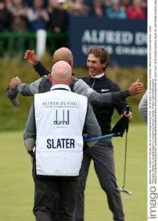 04.10.2015. St Andrews, Scotland. Alfred Dunhill Links Golf final round. Thorbjorn Olesen is congratulated by his playing partner Florian Fritsch xDavidxBlunsdenx  ActionPlus11669293