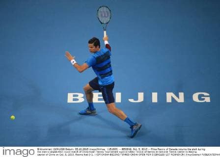 (151005) -- BEIJING, Oct. 5, 2015 -- Milos Raonic of Canada returns the shot during the men s singles first round match of China Open Tennis Tournament against Viktor Troicki of Serbia at National Tennis Center in Beijing, capital of China on Oct. 5, 2015. Raonic lost 0-2. ) (SP)CHINA-BEIJING-TENNIS-CHINA OPEN-MEN S SINGLES-1ST ROUND(CN) XingxGuangli 