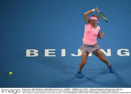 (151005) -- BEIJING, Oct. 5, 2015 -- Svetlana Kuznetsova of Russia returns the shot during the women s singles second round match of China Open Tennis Tournament against Sloane Stephens of the United States at National Tennis Center in Beijing, capital of China on Oct. 5, 2015. ) (SP)CHINA-BEIJING-TENNIS-CHINA OPEN-WOMEN S SINGLES-2ND ROUND(CN) XingxGuangli 