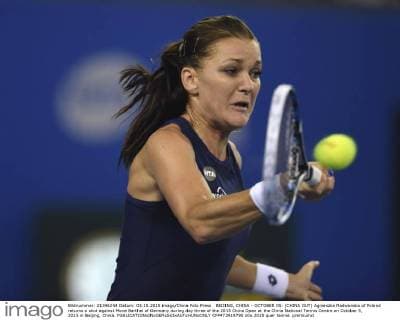 BEIJING, CHINA - OCTOBER 05: (CHINA OUT) Agnieszka Radwanska of Poland returns a shot against Mona Barthel of Germany during day three of the 2015 China Open at the China National Tennis Centre on October 5, 2015 in Beijing, China.  CFP473919790 