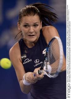 BEIJING, CHINA - OCTOBER 05: (CHINA OUT) Agnieszka Radwanska of Poland returns a shot against Mona Barthel of Germany during day three of the 2015 China Open at the China National Tennis Centre on October 5, 2015 in Beijing, China.  CFP473919795 