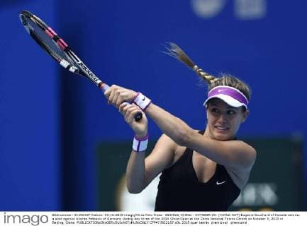 BEIJING, CHINA - OCTOBER 05: (CHINA OUT) Eugenie Bouchard of Canada returns a shot against Andrea Petkovic of Germany during day three of the 2015 China Open at the China National Tennis Centre on October 5, 2015 in Beijing, China.  CFP473922187 