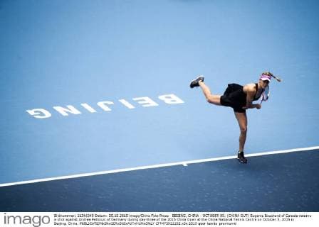 BEIJING, CHINA - OCTOBER 05: (CHINA OUT) Eugenie Bouchard of Canada returns a shot against Andrea Petkovic of Germany during day three of the 2015 China Open at the China National Tennis Centre on October 5, 2015 in Beijing, China.  CFP473922192 