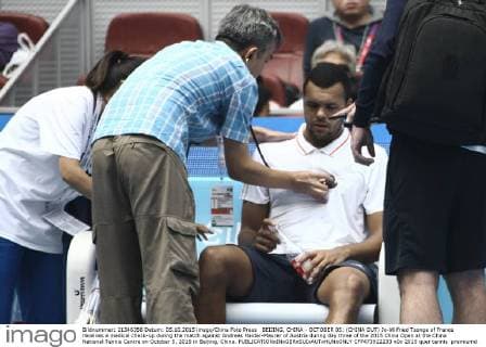 BEIJING, CHINA - OCTOBER 05: (CHINA OUT) Jo-Wilfried Tsonga of France receives a medical check-up during the match against Andreas Haider-Maurer of Austria during day three of the 2015 China Open at the China National Tennis Centre on October 5, 2015 in Beijing, China.  CFP473922233 