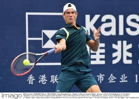 Guillermo Garcia-Lopez of Spain returns a shot to Tomas Berdych of the Czech Republic in the final match during the 2015 Shenzhen Open ATP Tennis Herren World Tour in Shenzhen city, south China s Guangdong province, 5 October 2015. Czech tennis player Tomas Berdych has won his first tournament of the year on Monday (5 October 2015). The top Czech men s singles player beat Spaniard Guillermo Garcia-Lopez in straight sets: 6:3, 7:6 at the Shenzen Open. He came back in the second set after trailing 0:3. The win puts 30-year-old Berdych on clear course to take part in the prestigious year end Masters tournament at the end of the year in London. Berdych beats Garcia-Lopez to win Shenzhen Open  pbu340902_11