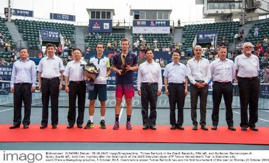 Tomas Berdych of the Czech Republic, fifth left, and Guillermo Garcia-Lopez of Spain, fourth left, hold their trophies after the final match of the 2015 Shenzhen Open ATP Tennis Herren World Tour in Shenzhen city, south China s Guangdong province, 5 October 2015. Czech tennis player Tomas Berdych has won his first tournament of the year on Monday (5 October 2015). The top Czech men s singles player beat Spaniard Guillermo Garcia-Lopez in straight sets: 6:3, 7:6 at the Shenzen Open. He came back in the second set after trailing 0:3. The win puts 30-year-old Berdych on clear course to take part in the prestigious year end Masters tournament at the end of the year in London. Berdych beats Garcia-Lopez to win Shenzhen Open  pbu340902_45