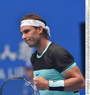 (151006) -- BEIJING, Oct. 6, 2015 -- Rafael Nadal of Spain celebrates during the men s singles first round match of China Open Tennis Tournament against Wu Di of China at the National Tennis Center in Beijing, capital of China, Oct. 6, 2015. Nadal won 2-0. ) (SP)CHINA-BEIJING-TENNIS-CHINA OPEN-MEN S SINGLES (CN) LixWen 