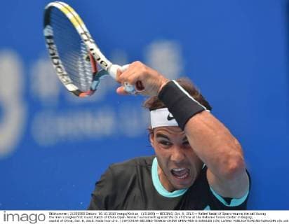 (151006) -- BEIJING, Oct. 6, 2015 -- Rafael Nadal of Spain returns the ball during the men s singles first round match of China Open Tennis Tournament against Wu Di of China at the National Tennis Center in Beijing, capital of China, Oct. 6, 2015. Nadal won 2-0. ) (SP)CHINA-BEIJING-TENNIS-CHINA OPEN-MEN S SINGLES (CN) LixWen 