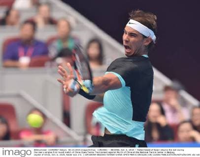 (151006) -- BEIJING, Oct. 6, 2015 -- Rafael Nadal of Spain returns the ball during the men s singles first round match of China Open Tennis Tournament against Wu Di of China at the National Tennis Center in Beijing, capital of China, Oct. 6, 2015. Nadal won 2-0. ) (SP)CHINA-BEIJING-TENNIS-CHINA OPEN-MEN S SINGLES (CN) LixWen 