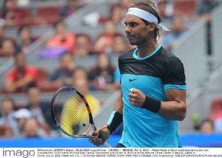 (151006) -- BEIJING, Oct. 6, 2015 -- Rafael Nadal of Spain celebrates during the men s singles first round match of China Open Tennis Tournament against Wu Di of China at the National Tennis Center in Beijing, capital of China, Oct. 6, 2015. Nadal won 2-0. ) (SP)CHINA-BEIJING-TENNIS-CHINA OPEN-MEN S SINGLES (CN) XingxGuangli 