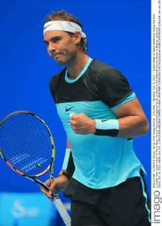 (151006) -- BEIJING, Oct. 6, 2015 -- Rafael Nadal of Spain celebrates during the men s singles first round match of China Open Tennis Tournament against Wu Di of China at the National Tennis Center in Beijing, capital of China, Oct. 6, 2015. Nadal won 2-0. ) (SP)CHINA-BEIJING-TENNIS-CHINA OPEN-MEN S SINGLES (CN) XingxGuangli 