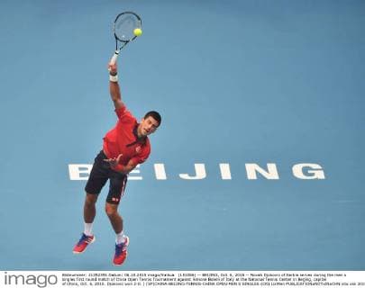 (151006) -- BEIJING, Oct. 6, 2015 -- Novak Djokovic of Serbia serves during the men s singles first round match of China Open Tennis Tournament against Simone Bolelli of Italy at the National Tennis Center in Beijing, capital of China, Oct. 6, 2015. Djokovic won 2-0. ) (SP)CHINA-BEIJING-TENNIS-CHINA OPEN-MEN S SINGLES (CN) LixWen 