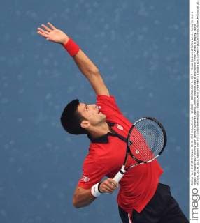 (151006) -- BEIJING, Oct. 6, 2015 -- Novak Djokovic of Serbia serves during the men s singles first round match of China Open Tennis Tournament against Simone Bolelli of Italy at the National Tennis Center in Beijing, capital of China, Oct. 6, 2015. Djokovic won 2-0. ) (SP)CHINA-BEIJING-TENNIS-CHINA OPEN-MEN S SINGLES (CN) LixWen 