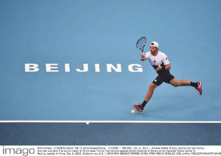 (151006) -- BEIJING, Oct. 6, 2015 -- Simone Bolelli of Italy returns the ball during the men s singles first round match of China Open Tennis Tournament against Novak Djokovic of Serbia at the National Tennis Center in Beijing, capital of China, Oct. 6, 2015. Djokovic won 2-0. ) (SP)CHINA-BEIJING-TENNIS-CHINA OPEN-MEN S SINGLES (CN) LixWen 