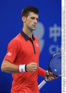 (151006) -- BEIJING, Oct. 6, 2015 -- Novak Djokovic of Serbia celebrates during the men s singles first round match of China Open Tennis Tournament against Simone Bolelli of Italy at the National Tennis Center in Beijing, capital of China, Oct. 6, 2015. Djokovic won 2-0. ) (SP)CHINA-BEIJING-TENNIS-CHINA OPEN-MEN S SINGLES (CN) XingxGuangli 