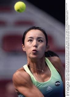 BEIJING, CHINA - OCTOBER 06: (CHINA OUT) Wang Qiang of China returns a shot against Caroline Wozniacki of Denmark during day four of the 2015 China Open at the China National Tennis Centre on October 6, 2015 in Beijing, China.  CFP473945991 