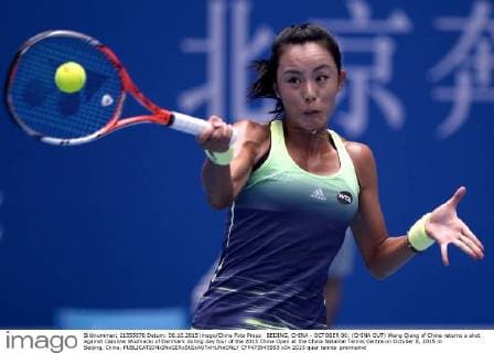 BEIJING, CHINA - OCTOBER 06: (CHINA OUT) Wang Qiang of China returns a shot against Caroline Wozniacki of Denmark during day four of the 2015 China Open at the China National Tennis Centre on October 6, 2015 in Beijing, China.  CFP473945993 