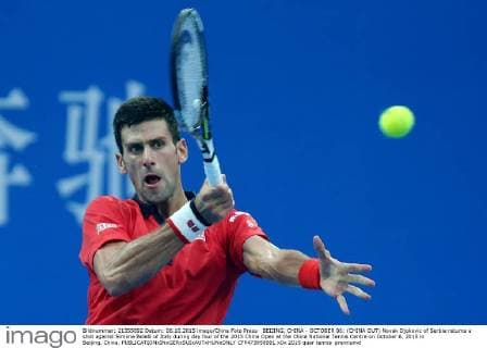 BEIJING, CHINA - OCTOBER 06: (CHINA OUT) Novak Djokovic of Serbia returns a shot against Simone Bolelli of Italy during day four of the 2015 China Open at the China National Tennis Centre on October 6, 2015 in Beijing, China.  CFP473958991 