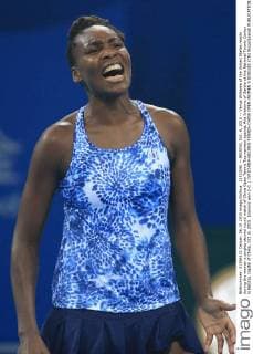 (151006) -- BEIJING, Oct. 6, 2015 -- Venus Williams of the United States reacts during the women s singles second round match of China Open Tennis Tournament against Ana Ivanovic of Serbia at the National Tennis Center in Beijing, capital of China, Oct. 6, 2015. Ivanovic won 2-0. ) (SP)CHINA-BEIJING-TENNIS-CHINA OPEN-WOMEN S SINGLES (CN) XingxGuangli 