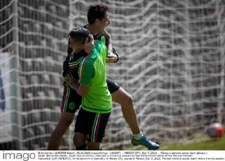 (151007) -- MEXICO CITY, Oct. 7, 2015 -- Mexico s national soccer team players y Javier Hernandez (Back), Javier Aquino (Front), take part in a training session at High Performance Center of the Mexican Football Federation (CAR-FEMEXFUT, for its acronym in Spanish), in Mexico City, capital of Mexico, Oct. 6, 2015. Mexican national soccer team held a training session on Tuesday ahead of its match against the United States national soccer team for a spot in the Confederations Cup Russia 2017, to be played on Oct. 10 at Rose Bowl stadium in California. Pedro Mera) (SP)MEXICO-MEXICO CITY-SOCCER-TRAINING e PedroxMera