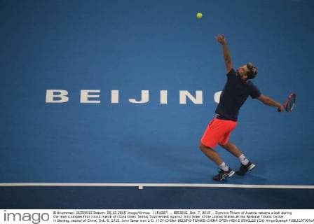 (151007) -- BEIJING, Oct. 7, 2015 -- Dominic Thiem of Austria returns a ball during the men s singles first round match of China Open Tennis Tournament against John Isner of the United States at the National Tennis Center in Beijing, capital of China, Oct. 6, 2015. John Isner won 2-0. ) (SP)CHINA-BEIJING-TENNIS-CHINA OPEN-MEN S SINGLES (CN) XingxGuangli 