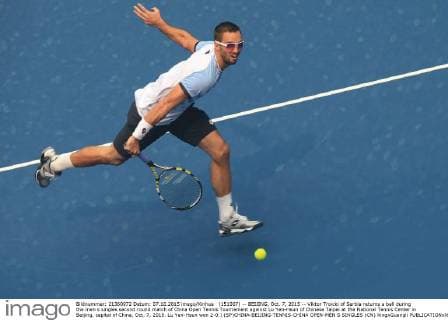(151007) -- BEIJING, Oct. 7, 2015 -- Viktor Troicki of Serbia returns a ball during the men s singles second round match of China Open Tennis Tournament against Lu Yen-Hsun of Chinese Taipei at the National Tennis Center in Beijing, capital of China, Oct. 7, 2015. Lu Yen-Hsun won 2-0.) (SP)CHINA-BEIJING-TENNIS-CHINA OPEN-MEN S SINGLES (CN) XingxGuangli 