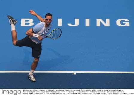 (151007) -- BEIJING, Oct. 7, 2015 -- Viktor Troicki of Serbia returns a ball during the men s singles second round match of China Open Tennis Tournament against Lu Yen-Hsun of Chinese Taipei at the National Tennis Center in Beijing, capital of China, Oct. 7, 2015. Lu Yen-Hsun won 2-0.) (SP)CHINA-BEIJING-TENNIS-CHINA OPEN-MEN S SINGLES (CN) XingxGuangli 
