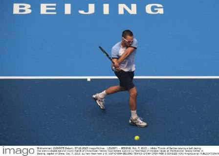 (151007) -- BEIJING, Oct. 7, 2015 -- Viktor Troicki of Serbia returns a ball during the men s singles second round match of China Open Tennis Tournament against Lu Yen-Hsun of Chinese Taipei at the National Tennis Center in Beijing, capital of China, Oct. 7, 2015. Lu Yen-Hsun won 2-0.) (SP)CHINA-BEIJING-TENNIS-CHINA OPEN-MEN S SINGLES (CN) XingxGuangli 