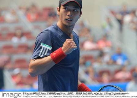 (151007) -- BEIJING, Oct. 7, 2015 -- Lu Yen-Hsun of Chinese Taipei celebrates scoring during the men s singles second round match of China Open Tennis Tournament against Viktor Troicki of Serbia at the National Tennis Center in Beijing, capital of China, Oct. 7, 2015. Lu Yen-Hsun won 2-0.) (SP)CHINA-BEIJING-TENNIS-CHINA OPEN-MEN S SINGLES (CN) XingxGuangli 
