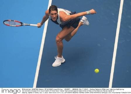 (151007) -- BEIJING, Oct. 7, 2015 -- Andrea Petkovic of Germany returns a ball during the women s singles third round match of China Open Tennis Tournament against Sara Errani of Italy at the National Tennis Center in Beijing, capital of China, Oct. 7, 2015. Sara Errani won 2-1.) (SP)CHINA-BEIJING-TENNIS-CHINA OPEN-WOMEN S SINGLES (CN) XingxGuangli 