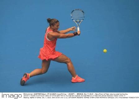 (151007) -- BEIJING, Oct. 7, 2015 -- Sara Errani of Italy returns a ball during the women s singles third round match of China Open Tennis Tournament against Andrea Petkovic of Germany at the National Tennis Center in Beijing, capital of China, Oct. 7, 2015. Sara Errani won 2-1.) (SP)CHINA-BEIJING-TENNIS-CHINA OPEN-WOMEN S SINGLES (CN) XingxGuangli 