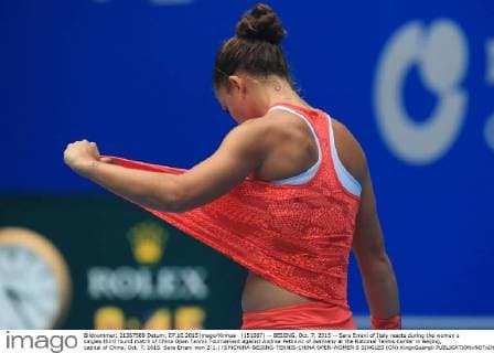 (151007) -- BEIJING, Oct. 7, 2015 -- Sara Errani of Italy reacts during the women s singles third round match of China Open Tennis Tournament against Andrea Petkovic of Germany at the National Tennis Center in Beijing, capital of China, Oct. 7, 2015. Sara Errani won 2-1.) (SP)CHINA-BEIJING-TENNIS-CHINA OPEN-WOMEN S SINGLES (CN) XingxGuangli 