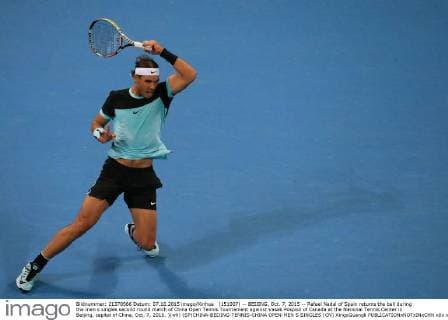 (151007) -- BEIJING, Oct. 7, 2015 -- Rafael Nadal of Spain returns the ball during the men s singles second round match of China Open Tennis Tournament against Vasek Pospisil of Canada at the National Tennis Center in Beijing, capital of China, Oct. 7, 2015. )(wll) (SP)CHINA-BEIJING-TENNIS-CHINA OPEN-MEN S SINGLES (CN) XingxGuangli 