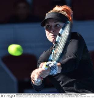 (151008) -- BEIJING, Oct. 8, 2015 -- Bethanie Mattek-Sands of the United States returns the ball during the women s singles third round match of China Open Tennis Tournament against Roberta Vinci of Italy at the National Tennis Center in Beijing, capital of China, Oct. 8, 2015. Bethanie Mattek-Sands won 2-1. ) (SP)CHINA-BEIJING-TENNIS-CHINA OPEN-WOMEN S SINGLES (CN) LixWen 