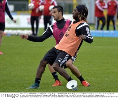 - ZAVENTEM, BELGIUM: Belgium s Nacer Chadli and Belgium s Luis Pedro Cavanda pictured in action during a training session of Belgian national soccer team Red Devils, Thursday 08 October 2015, in Zaventem. The Red Devils prepare for the upcoming Euro 2016 qualification games against Andorra and Israel. ERICxLALMAND  x04716728x
