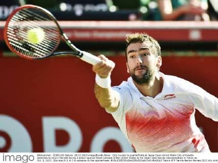 Cilic cruises to quarterfinals at Japan Open tennis Marin Cilic of Croatia stretches to return the ball during a match against Steve Johnson of the United States at the Japan Open tennis championships in Tokyo on Oct. 8, 2015. Cilic won 6-3, 6-3 to advance to the quarterfinals. 