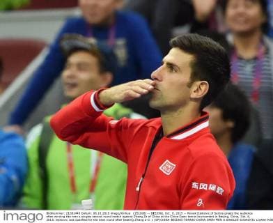 (151008) -- BEIJING, Oct. 8, 2015 -- Novak Djokovic of Serbia greets the audience after winning the men s singles second round match against Zhang Ze of China at the China Open tennis tournament in Beijing, China, Oct. 8, 2015. Djokovic was qualified for the next round after beating Zhang 2-0. ) (SP)CHINA-BEIJING-TENNIS-CHINA OPEN-MEN S SINGLES-DJOKOVIC LixWen 