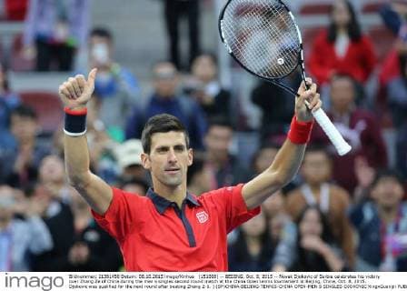 (151008) -- BEIJING, Oct. 8, 2015 -- Novak Djokovic of Serbia celebrates his victory over Zhang Ze of China during the men s singles second round match at the China Open tennis tournament in Beijing, China, Oct. 8, 2015. Djokovic was qualified for the next round after beating Zhang 2-0. ) (SP)CHINA-BEIJING-TENNIS-CHINA OPEN-MEN S SINGLES-DJOKOVIC XingxGuangli 