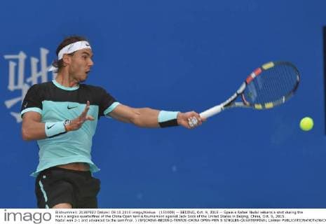 (151009) -- BEIJING, Oct. 9, 2015 -- Spain s Rafael Nadal returns a shot during the men s singles quarterfinal of the China Open tennis tournament against Jack Sock of the United States in Beijing, China, Oct. 9, 2015. Nadal won 2-1 and advanced to the semifinal. ) (SP)CHINA-BEIJING-TENNIS-CHINA OPEN-MEN S SINGLES-QUARTERFINAL LixWen 