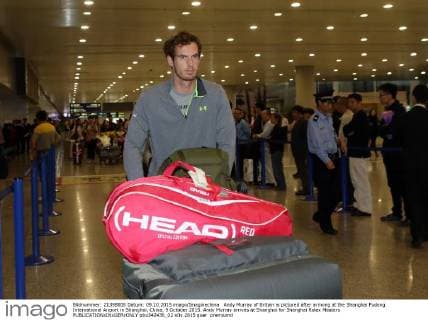 Andy Murray of Britain is pictured after arriving at the Shanghai Pudong International Airport in Shanghai, China, 9 October 2015. Andy Murray arrives at Shanghai for Shanghai Rolex Masters  pbu342436_02