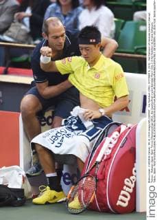 Kei Nishikori (JPN), OCTOBER 9, 2015 - Kei Nishikori of recieves medical time out. Tennis : Rakuten Japan Open Tennis Championships 2015, the Quarterfinal match between Marin Cilic 1-2 Kei Nishikori at Ariake Coliseum, Tokyo, Japan. NoxThirdxPartyxSales  (dlra010905)