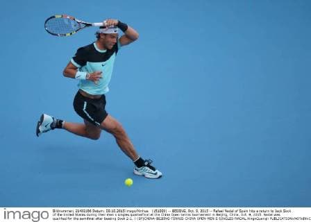 (151009) -- BEIJING, Oct. 9, 2015 -- Rafael Nadal of Spain hits a return to Jack Sock of the United States during their men s singles quarterfinal at the China Open tennis tournament in Beijing, China, Oct. 9, 2015. Nadal was qualified for the semifinal after beating Sock 2-1. ) (SP)CHINA-BEIJING-TENNIS-CHINA OPEN-MEN S SINGLES-NADAL XingxGuangli 