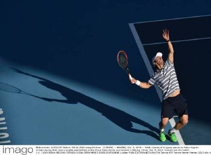 (151009) -- BEIJING, Oct. 9, 2015 -- Pablo Cuevas of Uruguay serves to Fabio Fognini of Italy during their men s singles quarterfinal at the China Open tennis tournament in Beijing, China, Oct. 9, 2015. Cuevas lost the match 1-2. ) (SP)CHINA-BEIJING-TENNIS-CHINA OPEN-MEN S SINGLES-FOGNINI LixWen 