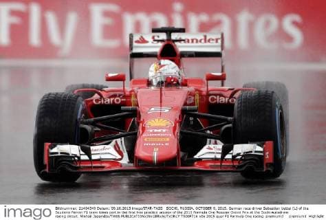 SOCHI, RUSSIA. OCTOBER 9, 2015. German race driver Sebastian Vettel (L) of the Scuderia Ferrari F1 team takes part in the first free practice session of the 2015 Formula One Russian Grand Prix at the Sochi Autodrom racing circuit. Mikhail Japaridze TASS  TS00F716