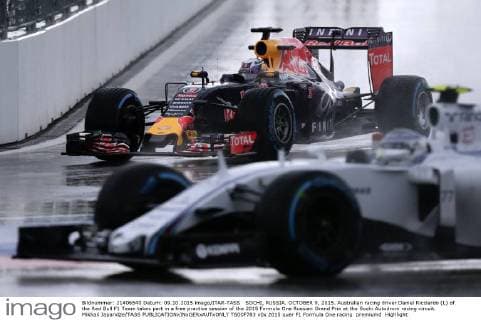 SOCHI, RUSSIA. OCTOBER 9, 2015. Australian racing driver Daniel Ricciardo (L) of the Red Bull F1 Team takes part in a free practice session of the 2015 Formula One Russian Grand Prix at the Sochi Autodrom racing circuit. Mikhail Japaridze TASS  TS00F783