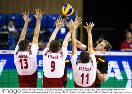 - VARNA, BULGARIA: Poland s Michal Kubiak , Poland s Mateusz Bieniek, Poland s Fabian Drzyzga and Belgium s Sam Deroo pictured in action during the game between Belgium and Poland in the group stage of Group C at the Volleybal European Championships in Bulgaria and Italy, Friday 09 October 2015, in Varna, Bulgaria. LAURIExDIEFFEMBACQ  x04717484x