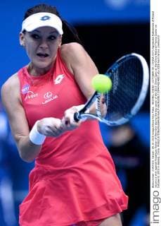 BEIJING, CHINA - OCTOBER 09: (CHINA OUT) Agnieszka Radwanska of Poland returns a shot against Angelique Kerber of Germany during the day seven of the 2015 China Open at the China National Tennis Center on October 9, 2015 in Beijing, China.  CFP474114003 