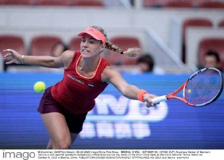 BEIJING, CHINA - OCTOBER 09: (CHINA OUT) Angelique Kerber of Germany returns a shot against Agnieszka Radwanska of Poland during the day seven of the 2015 China Open at the China National Tennis Center on October 9, 2015 in Beijing, China.  CFP474114002 