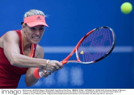 BEIJING, CHINA - OCTOBER 09: (CHINA OUT) Angelique Kerber of Germany returns a shot against Agnieszka Radwanska of Poland during the day seven of the 2015 China Open at the China National Tennis Center on October 9, 2015 in Beijing, China.  CFP474114007 